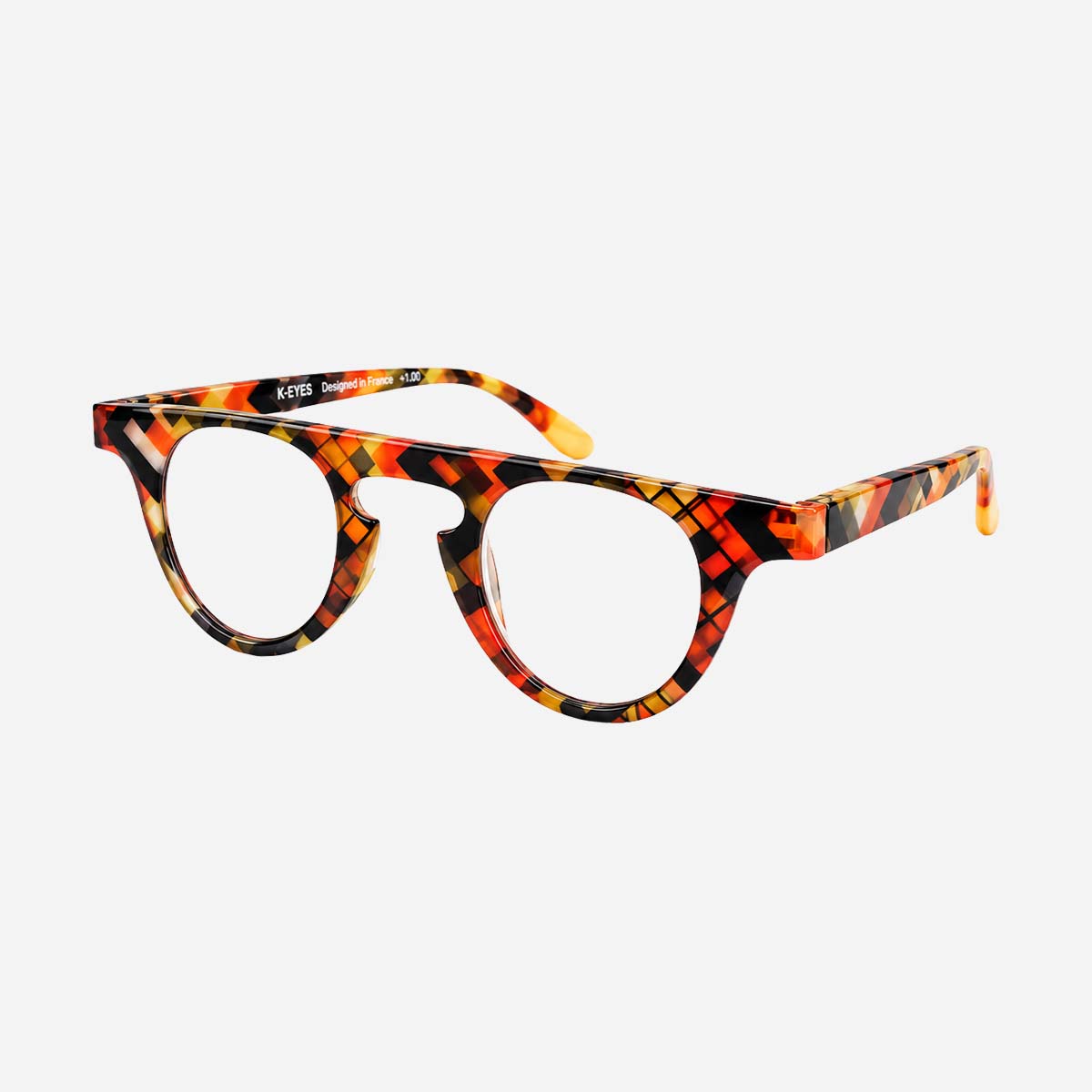 Lunettes de lecture unisexes à monture ronde, motif graphique jaune, rouge et noir.
Unisex reading glasses with a round frame featuring a yellow, red and black graphic pattern.